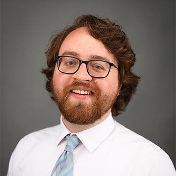 A headshot of Ryan Essinger