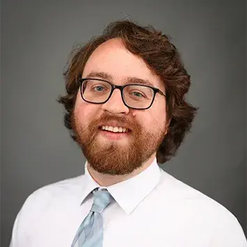 A headshot of Ryan Essinger